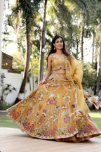 Mustard Silk Lehenga Set with Hand-Embroidered Folk Art Motifs
