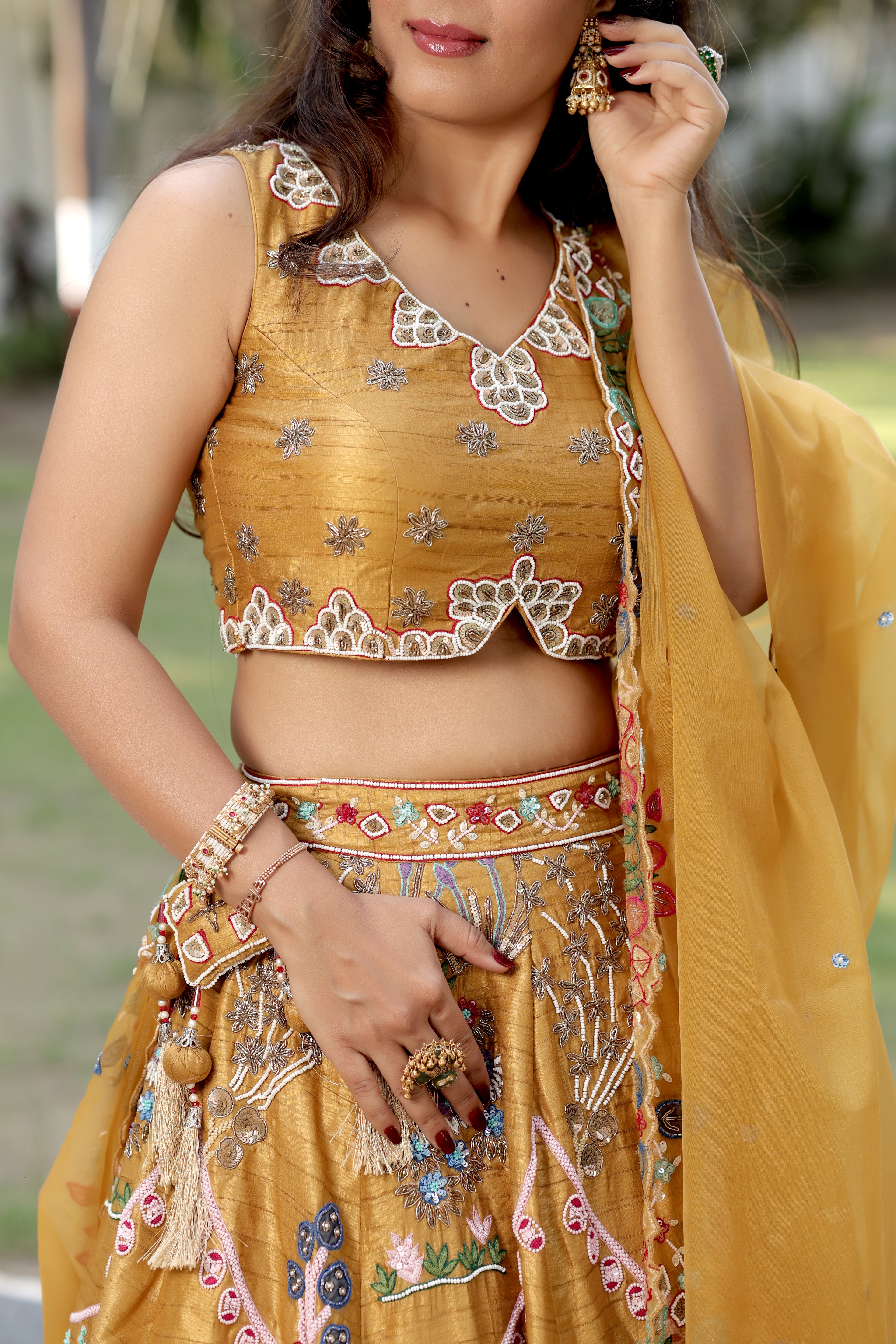 Mustard Silk Lehenga Set with Hand-Embroidered Folk Art Motifs