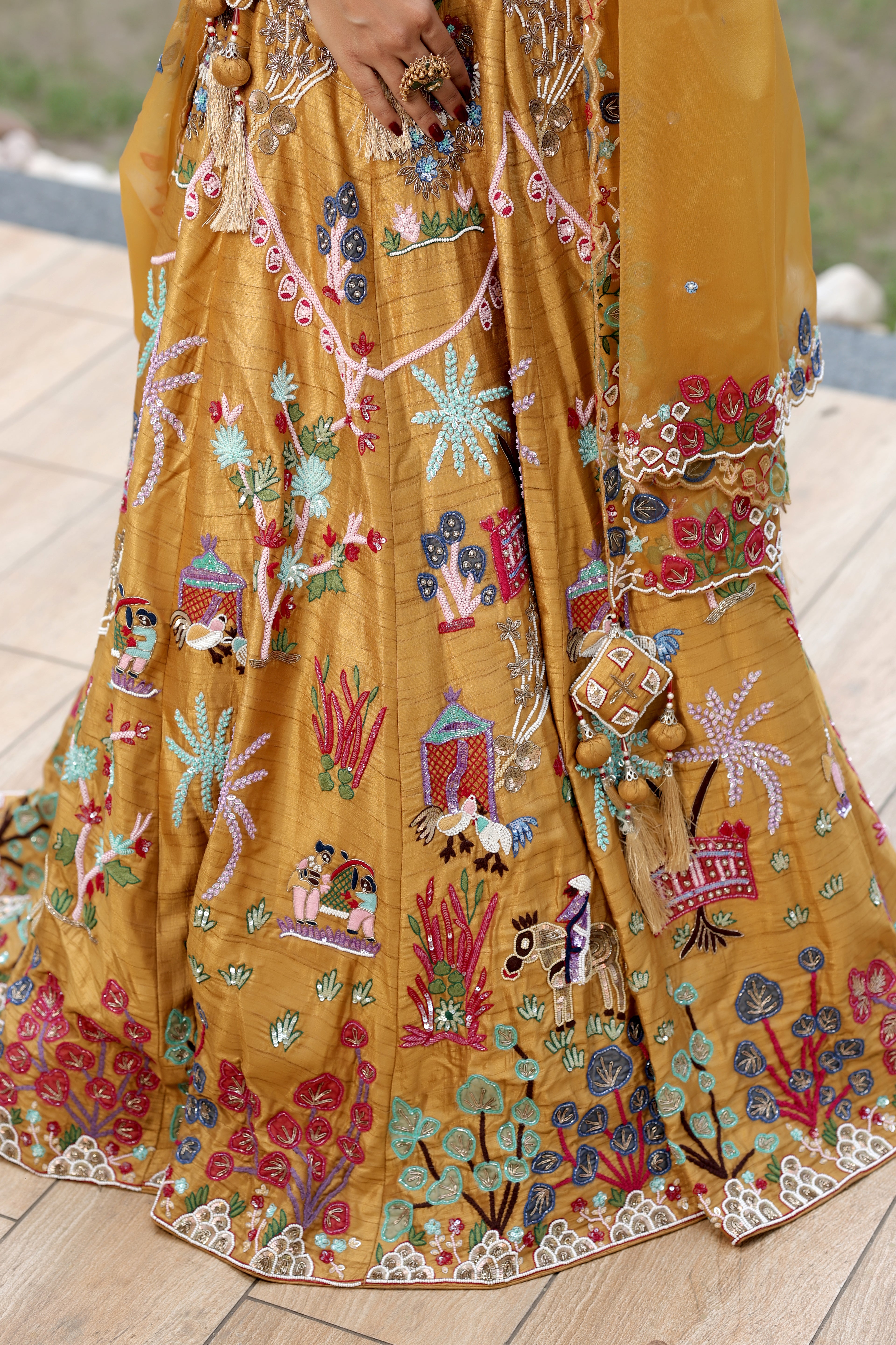 Mustard Silk Lehenga Set with Hand-Embroidered Folk Art Motifs
