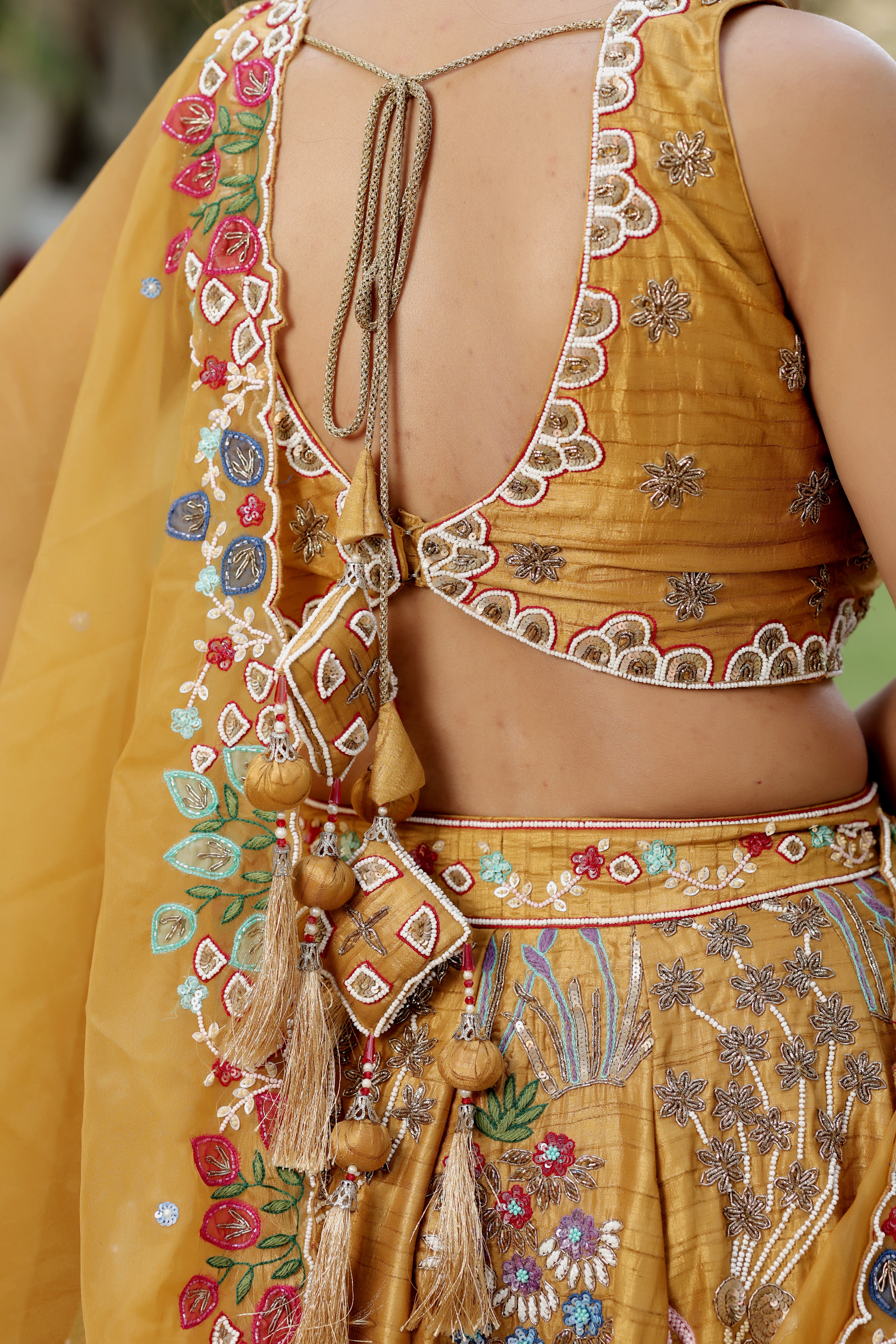 Mustard Silk Lehenga Set with Hand-Embroidered Folk Art Motifs