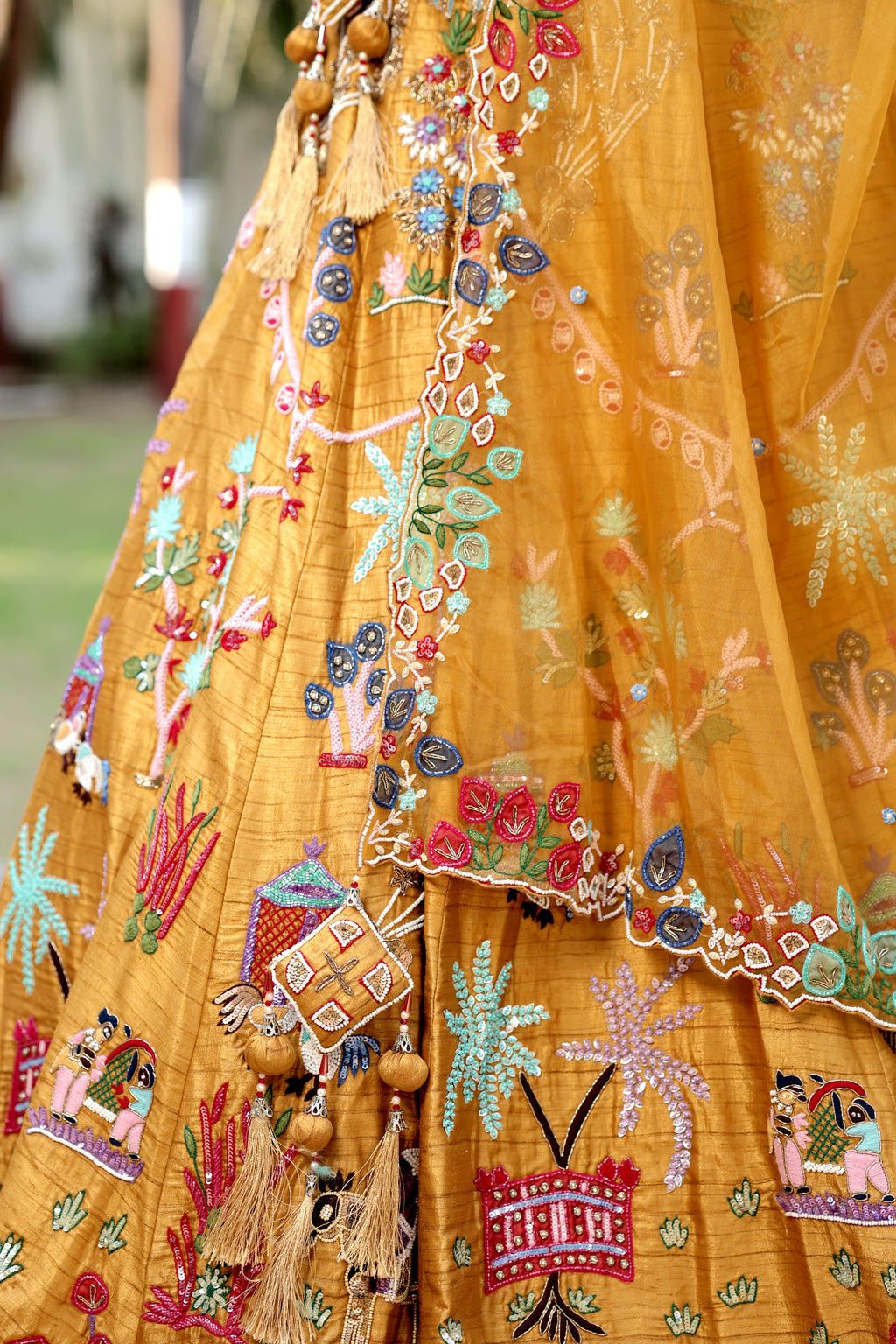 Mustard Silk Lehenga Set with Hand-Embroidered Folk Art Motifs