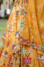 Mustard Silk Lehenga Set with Hand-Embroidered Folk Art Motifs