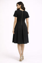 Black Fit-and-Flare Cocktail Dress with Gold Disc Embellishments