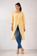 High-low asymmetric tunic with a wrap-effect front slit.