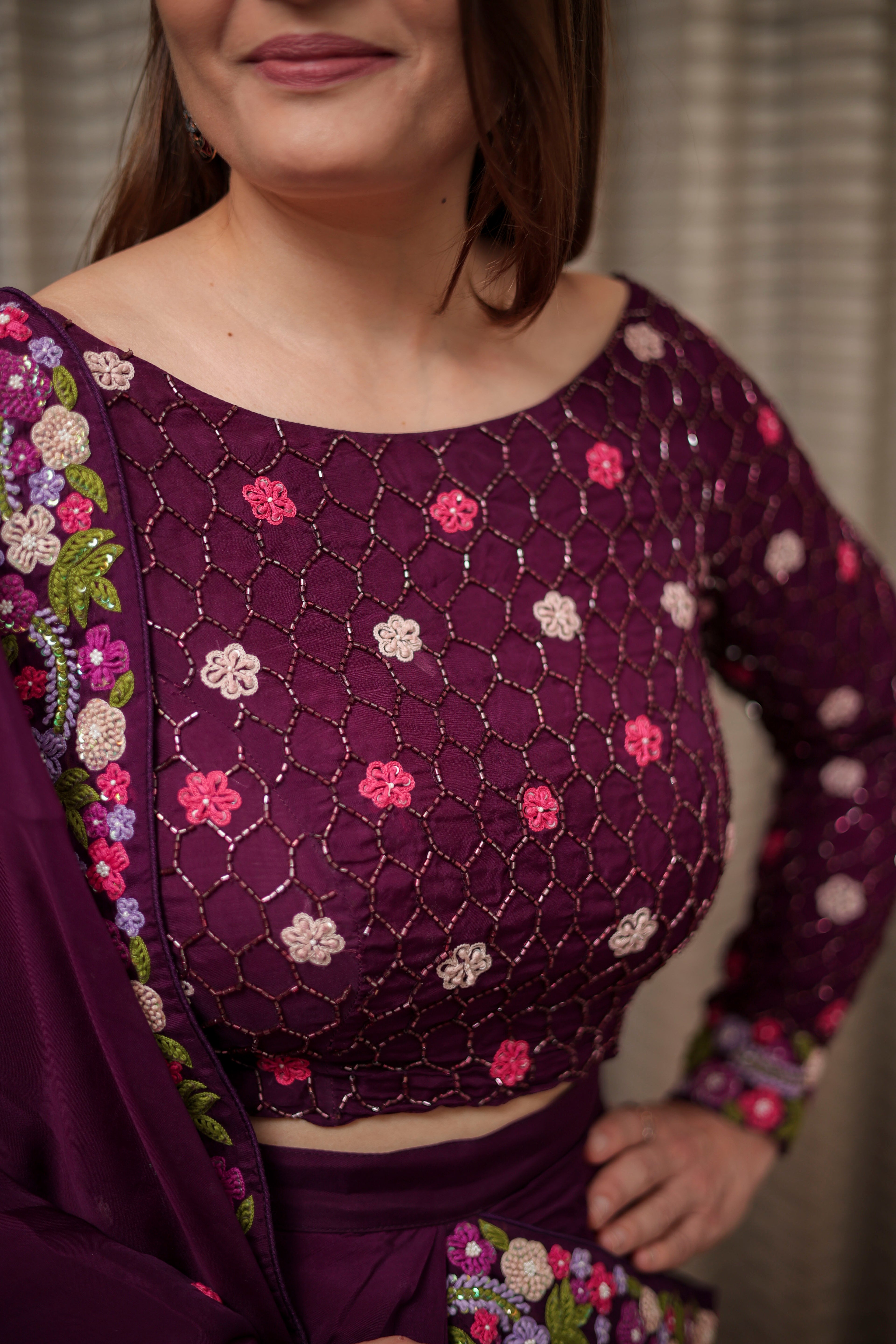 Plum Elegance Embroidered Saree