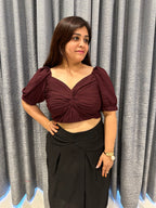 Twist-Detail Berry Crop Blouse Paired with Overlap Pleat Black Skirt