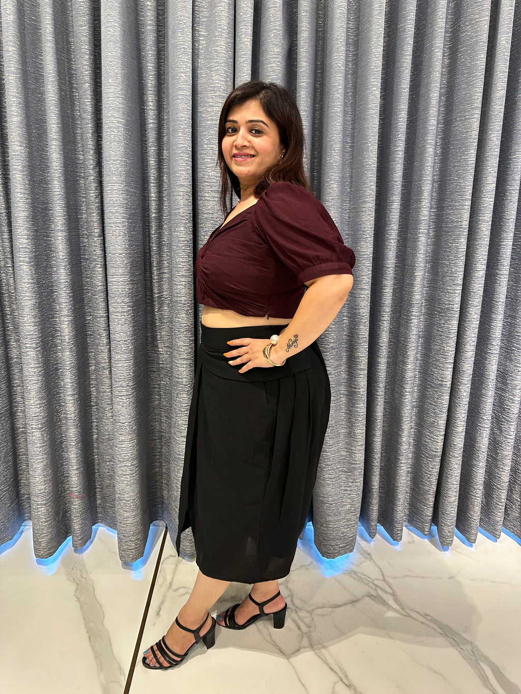 Twist-Detail Berry Crop Blouse Paired with Overlap Pleat Black Skirt