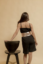 Elegant Black Jumpsuit with Statement Gold Waistband