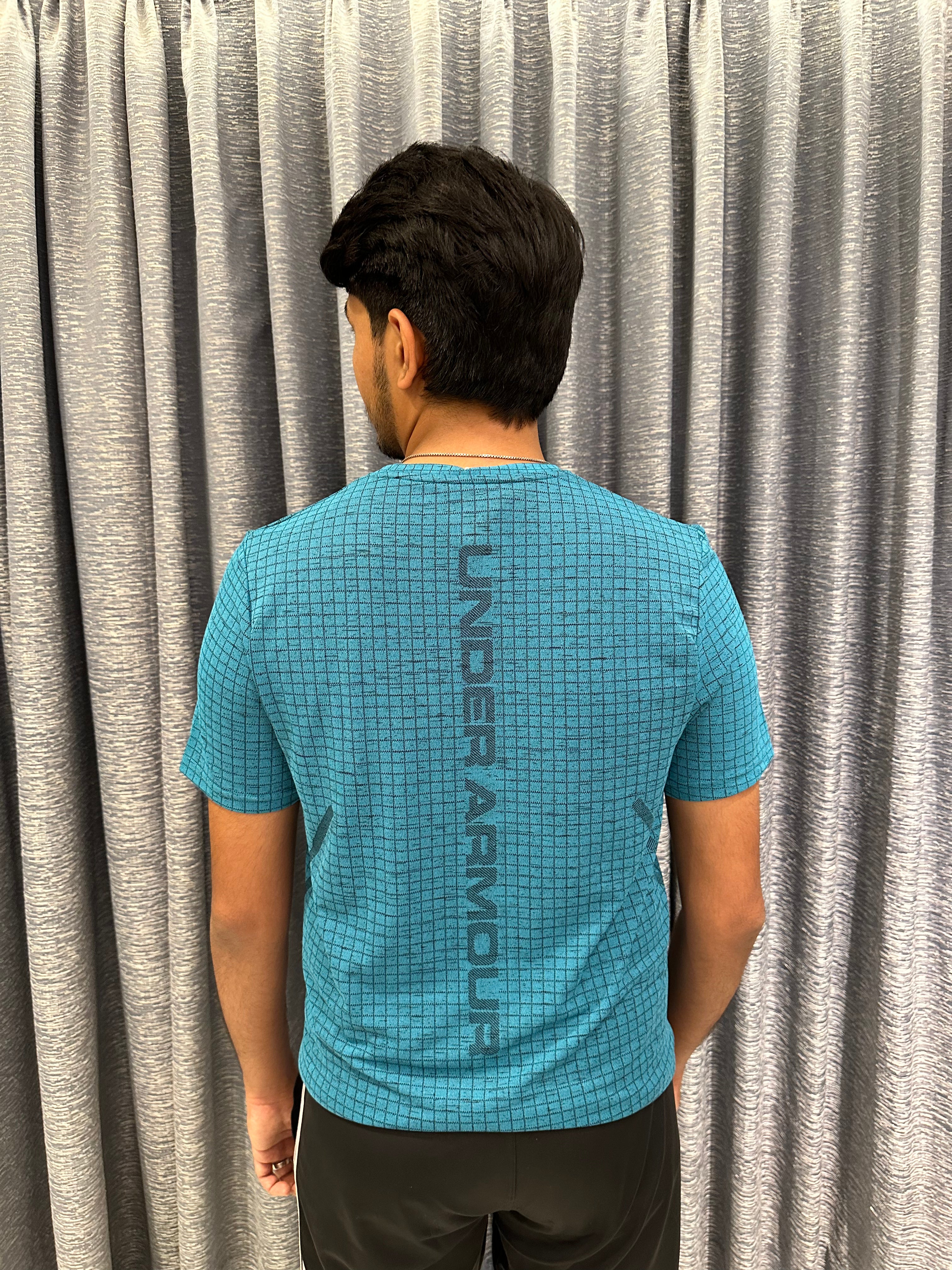 Grid-Print Performance Tee – Vibrant Cyan Blue