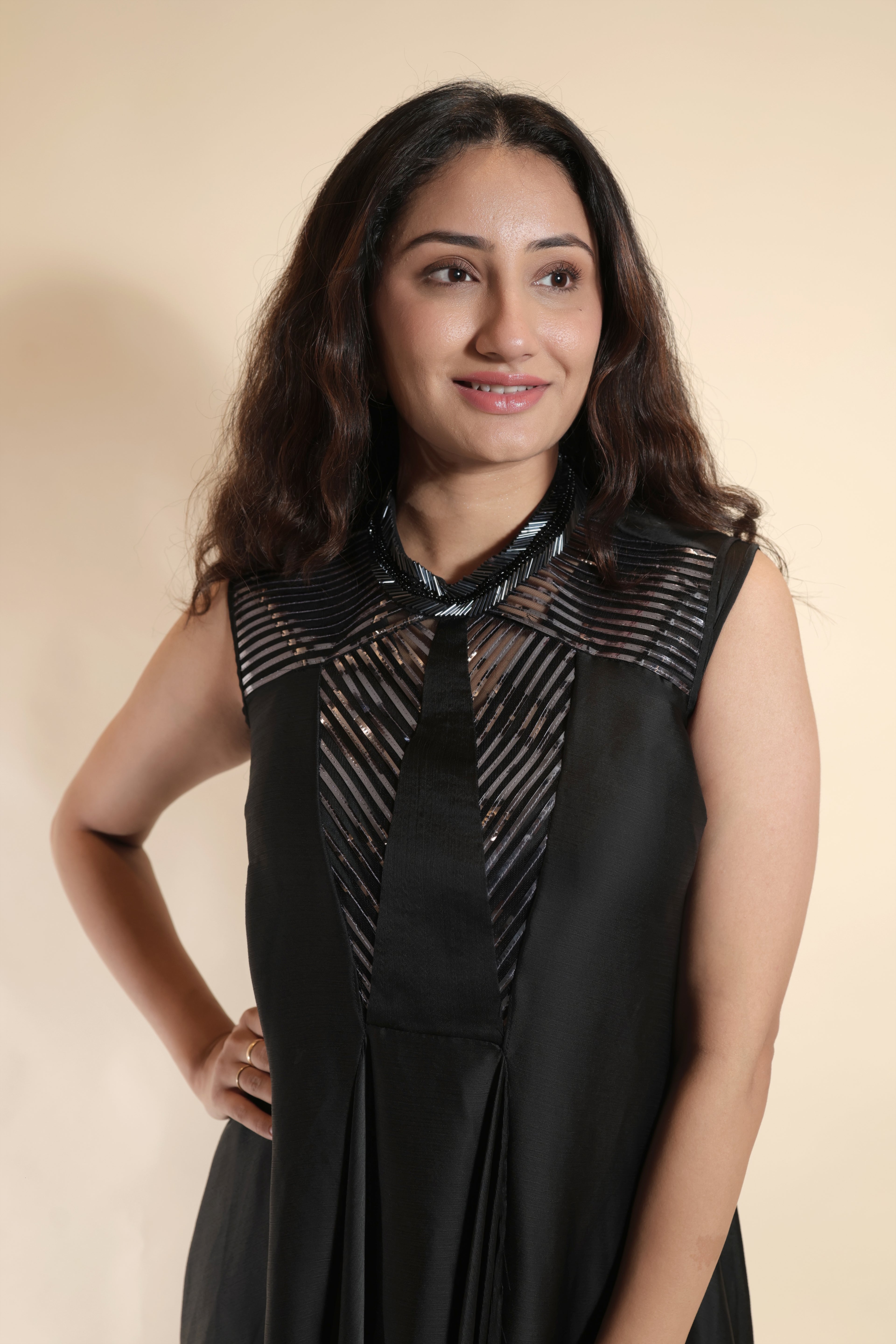 Sleek Black Gown with Embellished Neckline