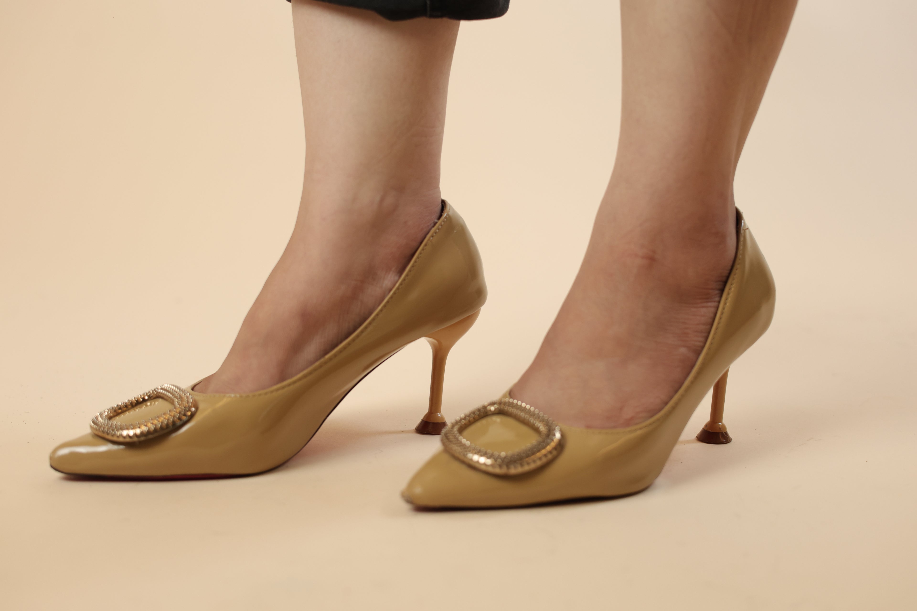 Nude Patent Pointed-Toe Pumps with Gold Buckle