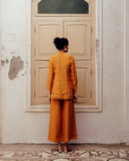 Vibrant Ochre Silk Kurta Set with Minimalist Piping